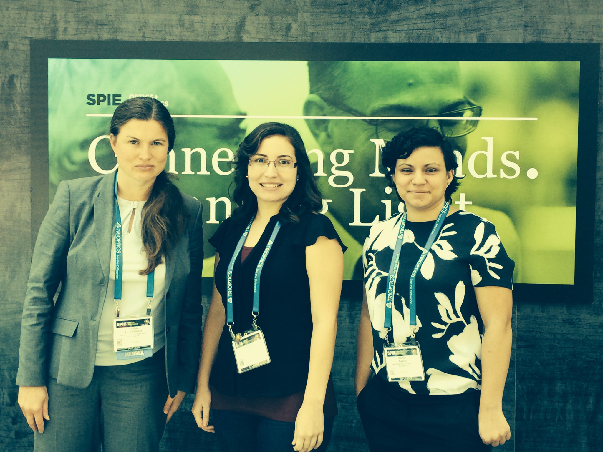 Dr. Kuznetsova, Priscilla Kelly, and Carla Bacco at SPIE 2015.