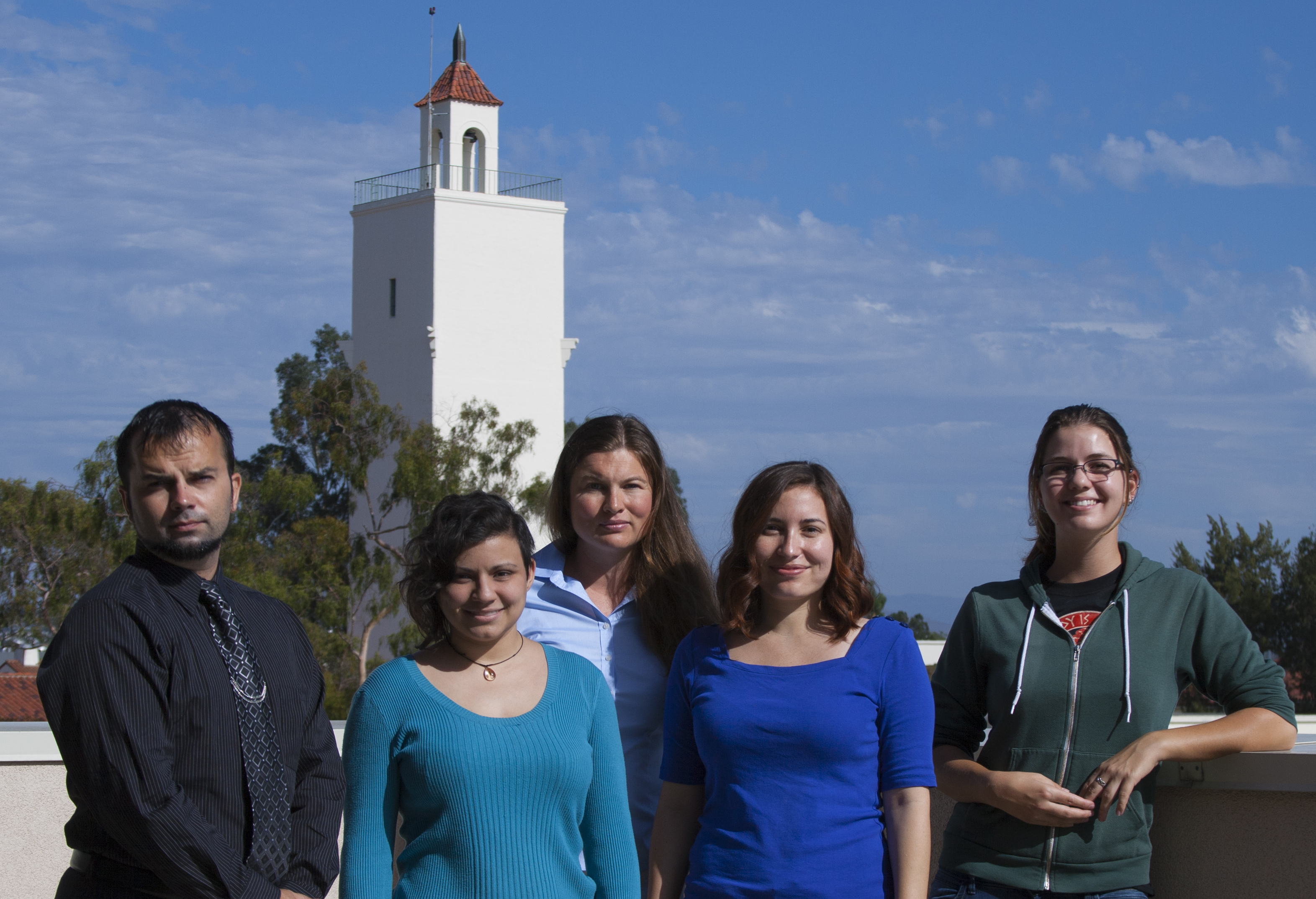 four females and one male standing in front of a building at SDSU